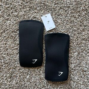 Gymshark Black Knee Sleeves with White Tag